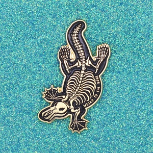 Platypus Skeleton Enamel Pin Badge Weird to the Bone - Gold Metal Designer Lapel Pin - Alternative Enamel Pin - Skull Goth Spooky Accessory