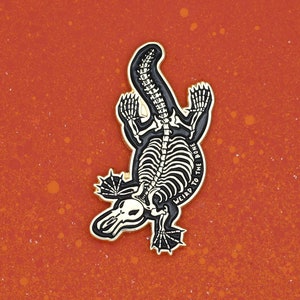 Weird to the Bone Platypus Skeleton Enamel Pin Badge - Gold Enamel Pin Badge - Skull Lapel Pin - Alternative Enamel Pin - Spooky Pin Badge