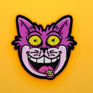 Cheshire Cat bordado Iron-on Parche - Alicia en el país de las maravillas - parches divertidos - parches groseros - insignia de gato ácido - parches alternativos lindos