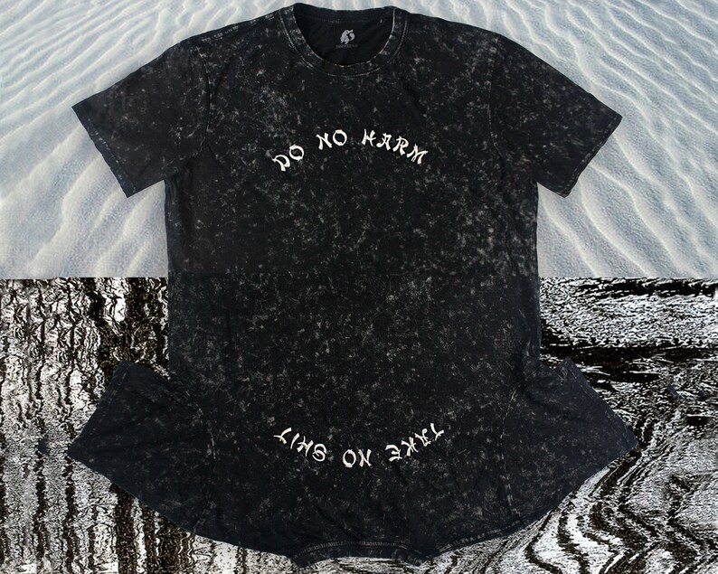 May include: Black t-shirt with a white distressed print that says "Do No Harm" and "Take On The Sky".
