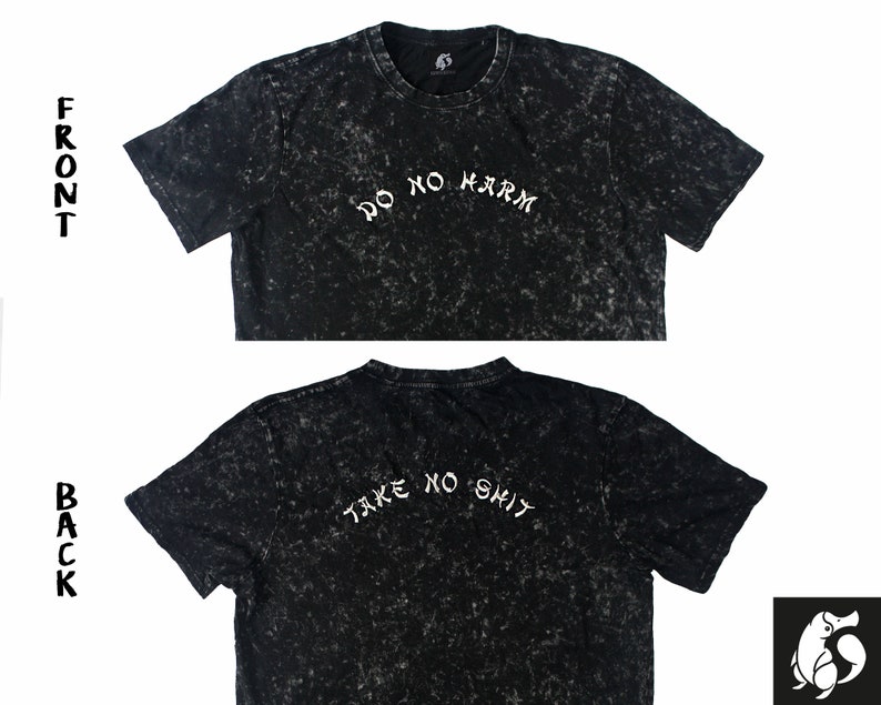 May include: Black t-shirt with a distressed, speckled look. The front of the shirt says "Do No Harm" in white lettering. The back of the shirt says "Take No Shit" in white lettering.