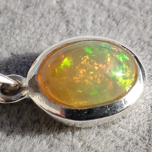 Natural Ethiopian opal pendant. Opal gemstone jewelry. Opal sterling silver 925 Pendant. Real Opal pendant.Handmade Opal Pendant. Fire Opal
