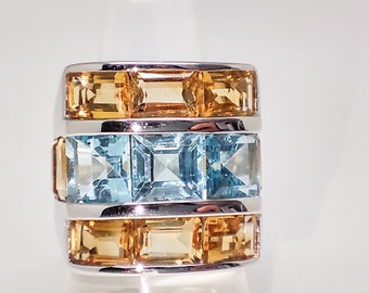 Ring mit mehreren Steinen. Ring aus 925er Sterlingsilber, besetzt mit echten, natürlichen Citrinen und blauem Topas. Originelles Geschenk. Einzigartiger Ring.