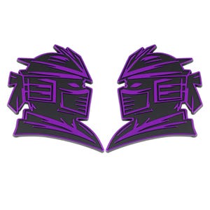 May include: Two identical black and purple graphic designs of a helmeted face, possibly a character from a comic or animated series. The design features a black outline with purple accents, creating a striking contrast. The image is set against a white background.