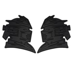 May include: Two black, stylised head silhouettes with angular features and a helmet-like design. The symmetrical shapes are set against a white background, creating a bold contrast. The design is reminiscent of a futuristic or robotic theme.