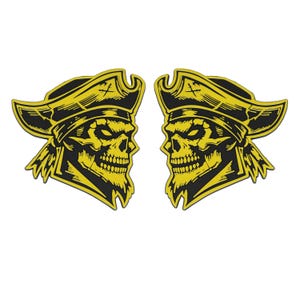 May include: Two black and yellow skull pirate heads with a yellow pirate hat and a black cross on the hat. The skulls are facing opposite directions.