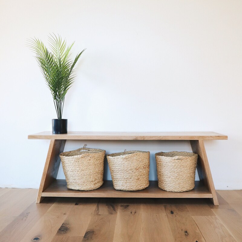 Illustration of Natural Wood Entryway With White Bench
