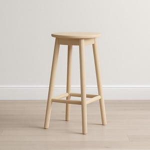 May include: A light-colored wooden bar stool with a round seat and four straight legs. The stool has a footrest and is made of a light-colored wood. The stool is simple and modern in design.