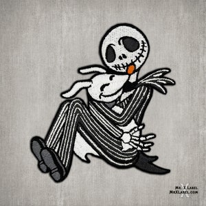 May include: Black and white embroidered patch of Jack Skellington from The Nightmare Before Christmas hugging Zero, his ghost dog.