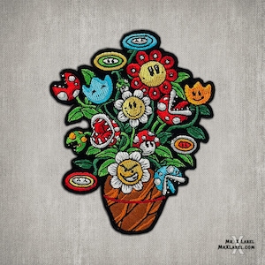 May include: Embroidered patch featuring a colorful bouquet of flowers, plants, and mushrooms in a brown pot. The flowers have smiling faces and the plants have teeth. The patch is perfect for adding a whimsical touch to clothing, bags, or other accessories.