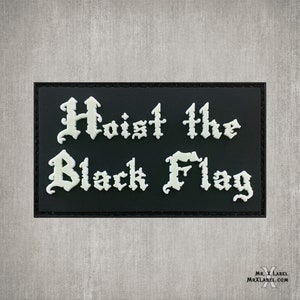 May include: Black patch with white text that reads "Hoist the Black Flag" in a gothic font.