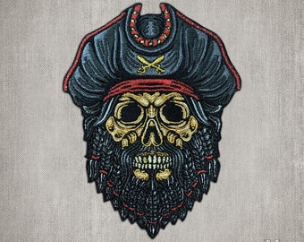 May include: An embroidered patch featuring a skull with a thick black beard wearing a dark pirate hat with a red band and gold crossed swords. The skull is yellow with black shading. The text MR. X LABEL MRXLABEL.COM is in the bottom right corner.