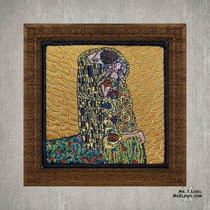 May include: Embroidered artwork of Gustav Klimt's "The Kiss" in a wooden frame. The artwork features gold, black, and colorful details. The figures are embracing, set against a gold background with a textured pattern. The frame is brown with intricate carvings.