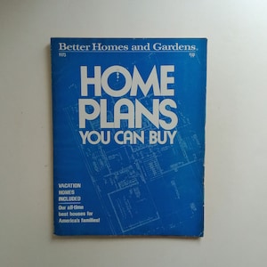 May include: A blue book cover with the title "HOME PLANS YOU CAN BUY" and the text "Better Homes and Gardens, 1973" at the top. The cover also includes the text "VACATION HOMES INCLUDED Our all-time best houses for America's families!"