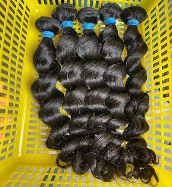 Pacchetti di capelli vergini brasiliani con onde morbide Italia