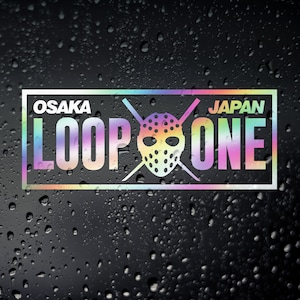 May include: A rainbow iridescent sticker with the text "OSAKA LOOP ONE JAPAN" and a hockey mask graphic.