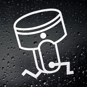 以下が含まれることがあります： 黒い背景に水滴がついたピストンの白いアウトライン