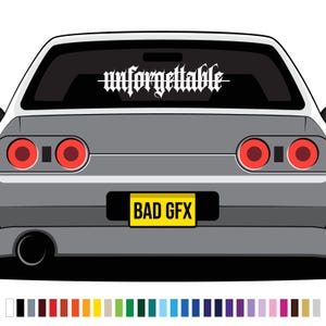 May include: A grey car with a white decal on the rear window that says "unforgettable" and a yellow number plate that says "BAD GFX".