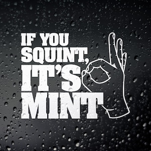 May include: A black background with white text saying "IF YOU SQUINT, IT'S MINT" and a hand making an "OK" sign. The background has a pattern of water droplets.