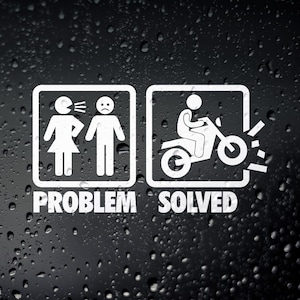 May include: White sticker with two panels. The left panel shows a stick figure woman yelling at a sad stick figure man. The right panel shows a stick figure riding a motorcycle. Text reads "PROBLEM SOLVED".