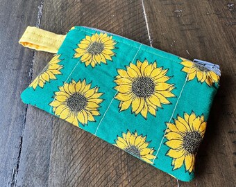Estuche con cremallera y diseño de girasol