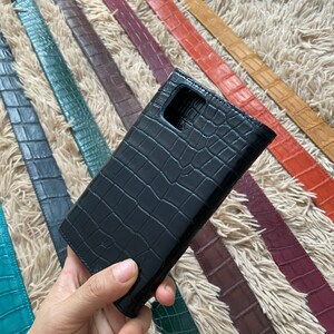 Funda de cuero hecha a mano con tapa para teléfono