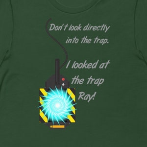 May include: Green t-shirt with a Ghostbusters proton pack and the text "Don't look directly into the trap. I looked at the trap Ray!"