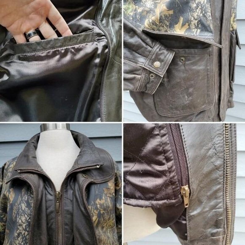 Op de afbeelding: Bruine leren jas met een camouflagepatroon op de schouders en bovenarmen. De jas heeft meerdere zakken, een ritssluiting en een gewatteerde voering. De jas wordt op een mannequin gepresenteerd.