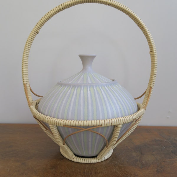 Beautiful ceramic bowl in a basket in the manner of Hedwig Bollhagen 1950s