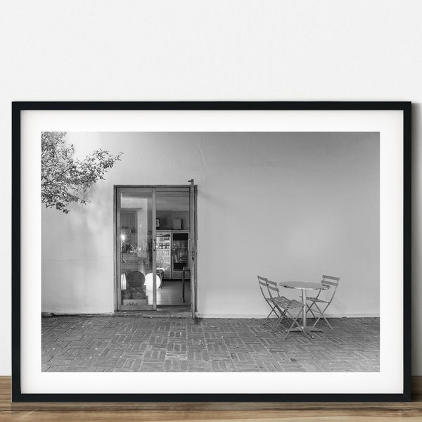 Cafe with a table black and white travel photography.  Printable wall art. Ready made to print out for any ratio.