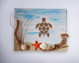 Décoration murale tableau de sable Tortue dorée et coquillages