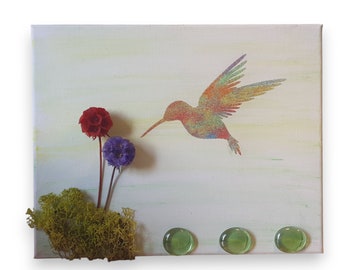 Kolibri-Sandmalerei-Wanddekoration und konservierte Pflanzen
