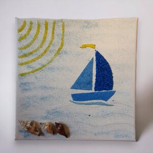 Sailboat sand painting wall decoration on the sea