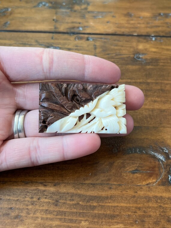 carved bone brooch Gem