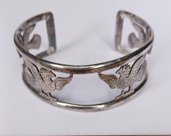 Bracciale rigido vintage in argento sterling con aquila e grifone traforati – punzonato 925 – 30,6 g