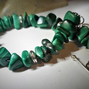 Malachite chip bracelet , 6 3/4 in. (17.2 cm) , .925 Sterling Silver beads , bead caps and toggle clasp