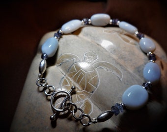 Pale Blue  oval Opal and Iolite rondelle bracelet 6 3/4 inch with .925 Sterling Silver toggle clasp.