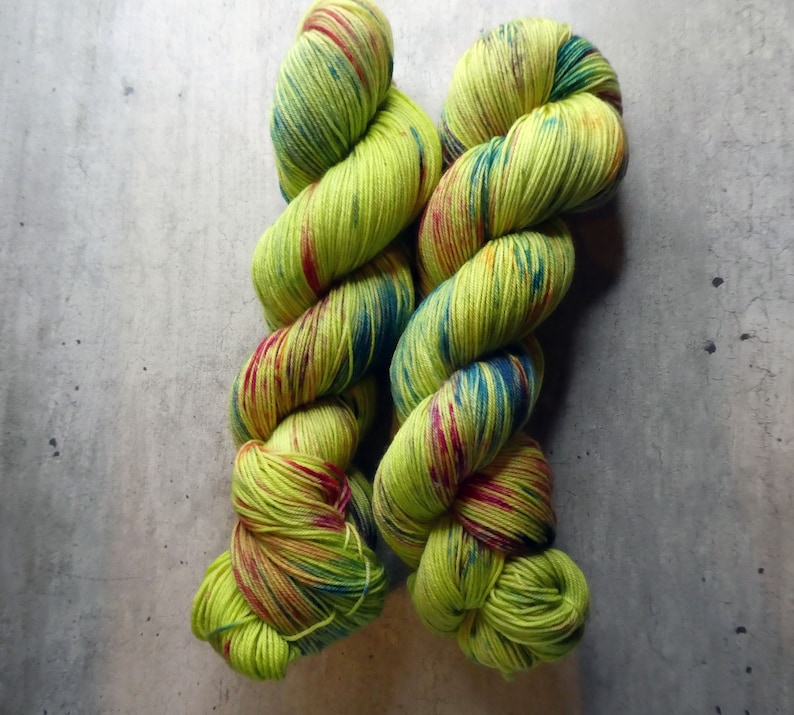 Handdyed Platinum 7525 merinonylon fingering weight yarn Kiwi Explosion