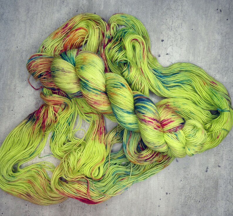 Handdyed Platinum 7525 merinonylon fingering weight yarn Kiwi Explosion