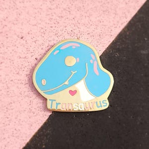 Trans Pride Transaurus Dinosaur Enamel Pin