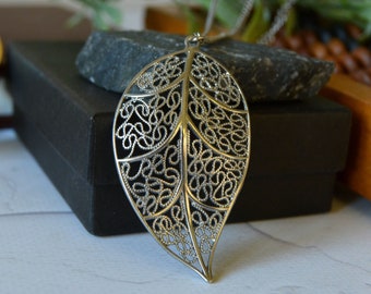 Vintage filigree leaf pendant, Silver tone pendant on long chain 31 inches