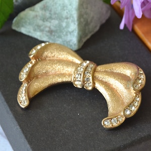 Vintage Gold Tone Bow Brooch with Rhinestones