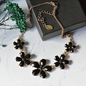 Vintage crystal flower necklace, Black floral bib necklace signed Claire&#39;s