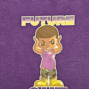 May include: Purple t-shirt with a cartoon illustration of a young man with a purple shirt, camouflage pants, and yellow shoes. The text "FUTURE QUE" is printed on the shirt.