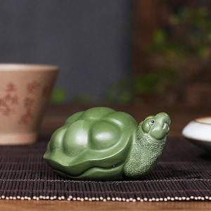 Purely handmade Yixing purple sand carved  turtle tea pet ornaments, home and office personality and creative ornaments