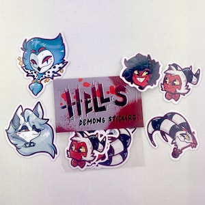 May include: A set of Hell's Demons Stickers featuring various cartoon characters. The stickers are printed on white paper and feature a variety of colours, including red, black, white, and blue. The stickers are all different sizes and shapes, and they all feature a different character from the show "Helluva Boss".
