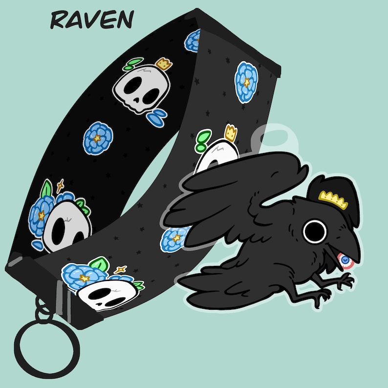 May include: Black and white illustrated collar with a raven, skulls, and blue flowers. The text "RAVEN" is printed on the collar.
