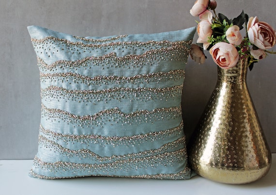 Light blue and gold throw pillows hotsell