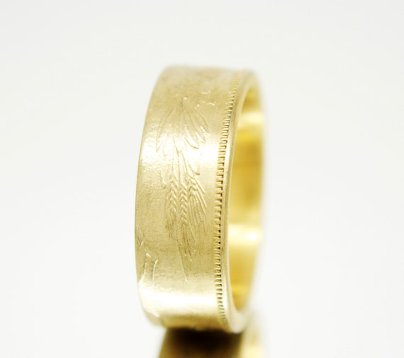 Gold coin wedding best sale band