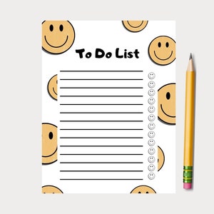 May include: A white printable to-do list with a black border and black lines. The background is decorated with yellow smiley faces.